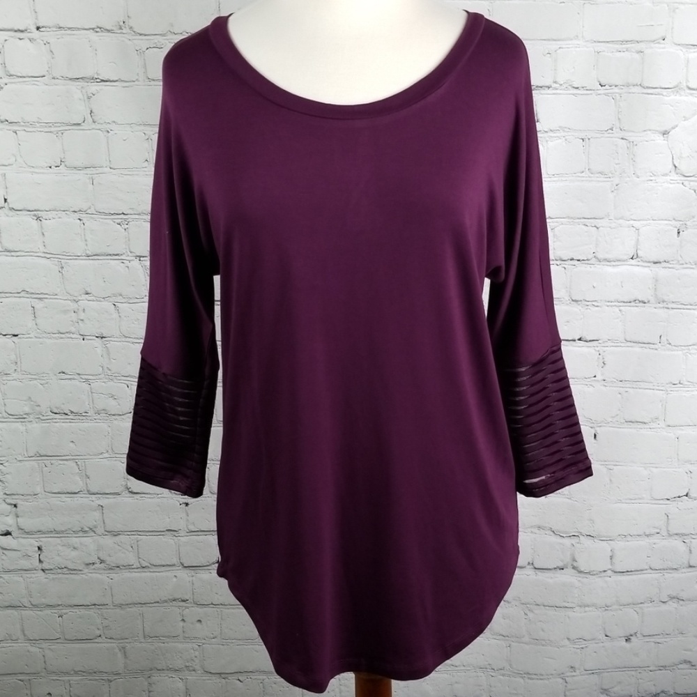 Charming Charlie purple back zip top
